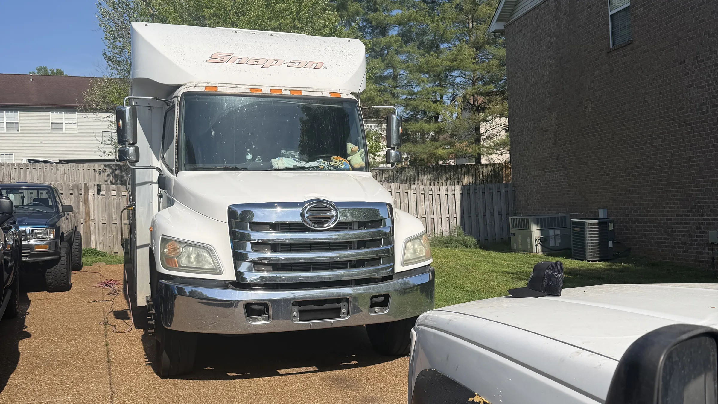 Service truck parked outside at a customer site