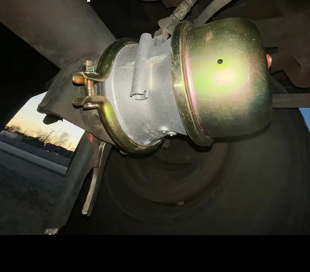 Air brake chamber and S-cam viewed from under the chassis