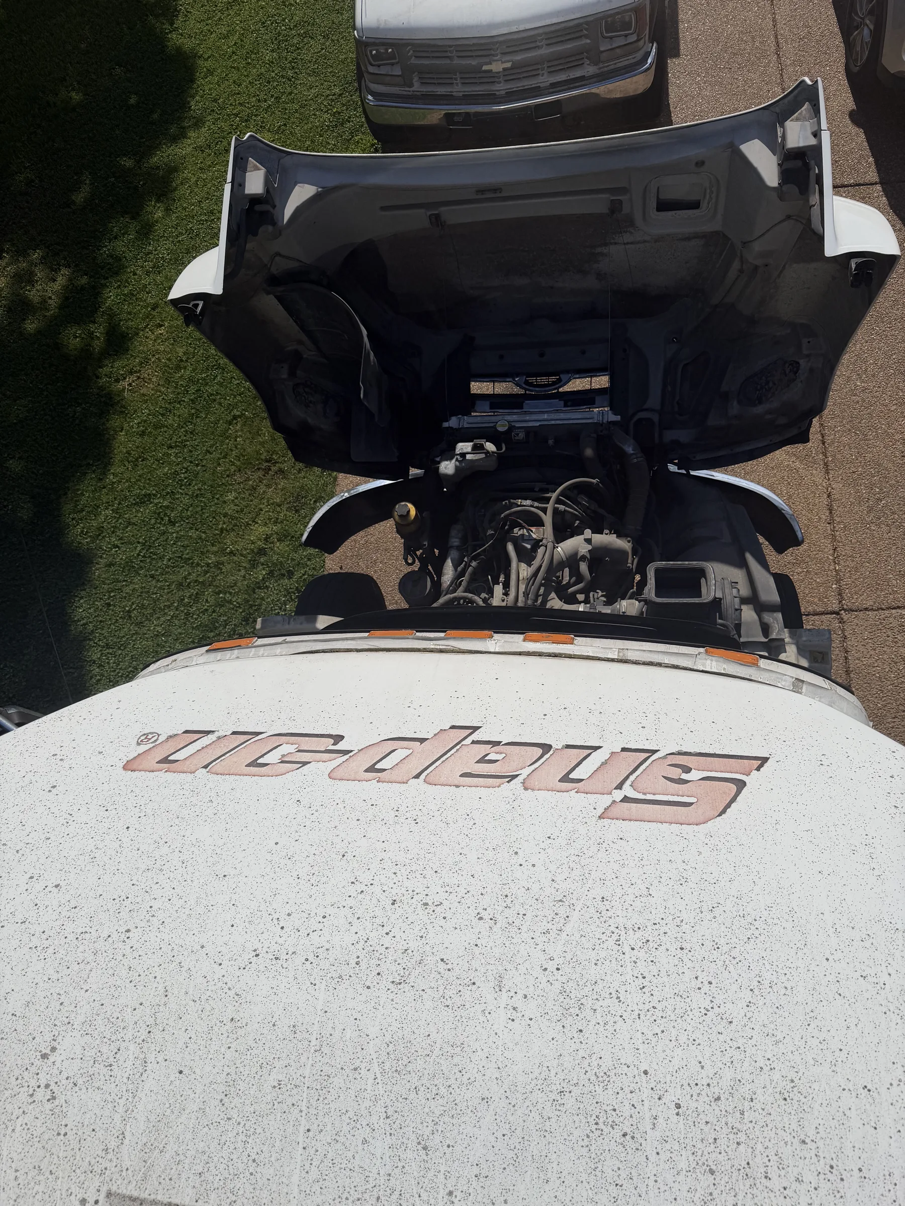 Mobile tool truck parked next to a customer truck