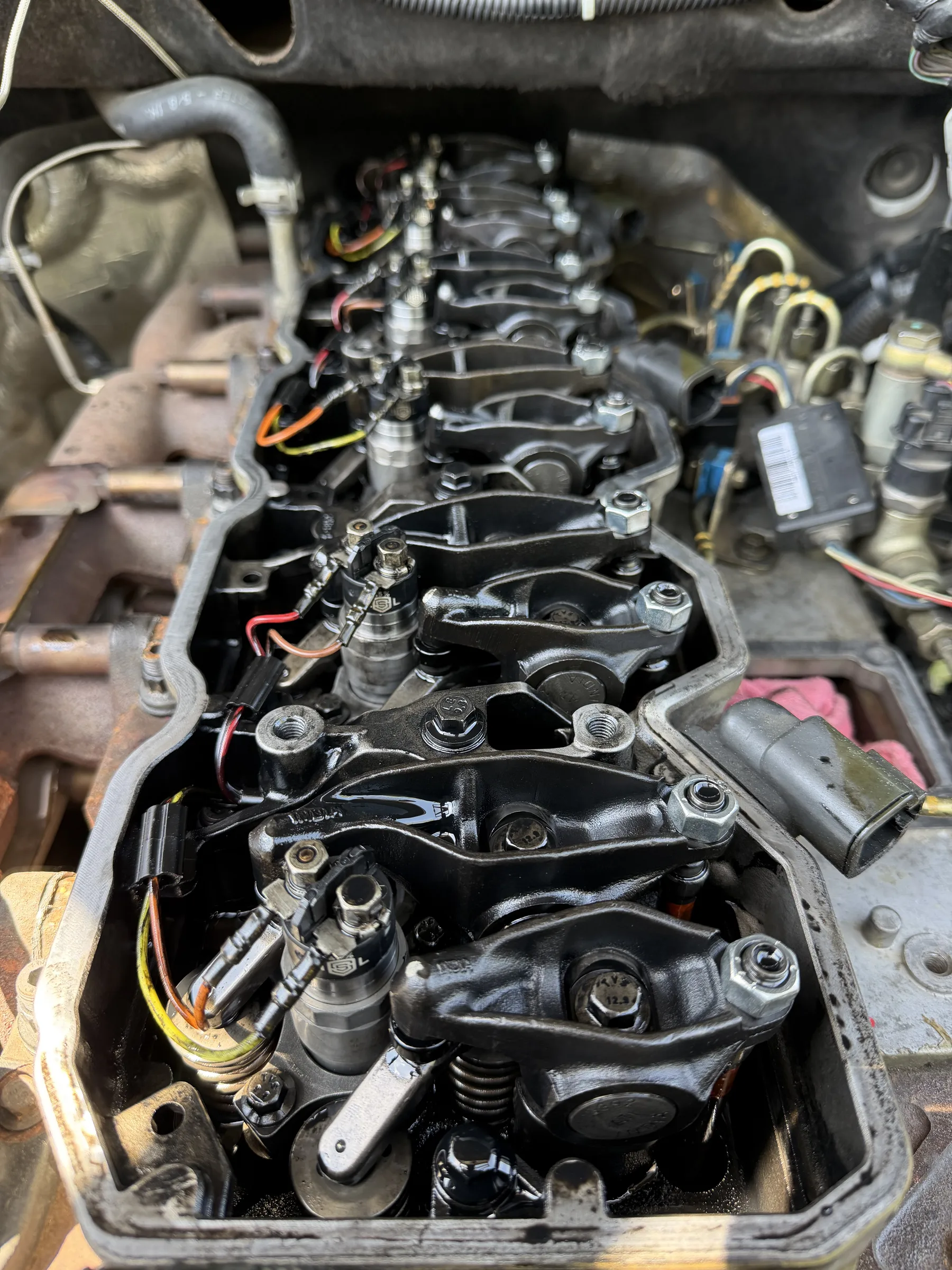 Engine head with rocker arms exposed during service