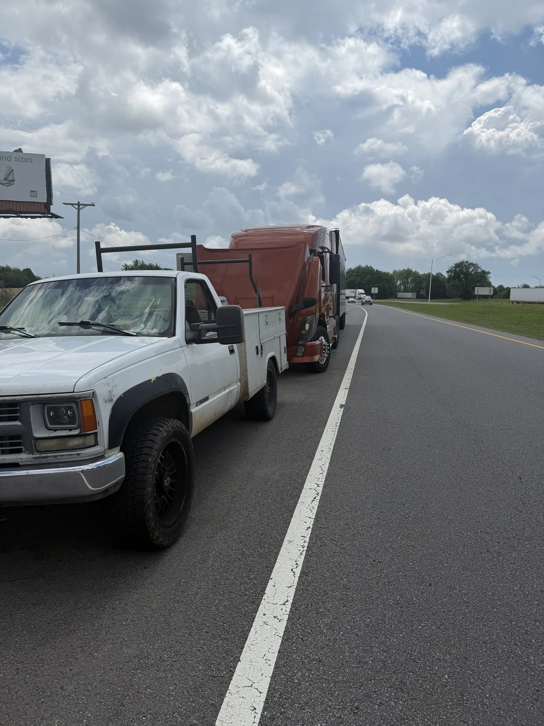 Service truck pulled over on the shoulder