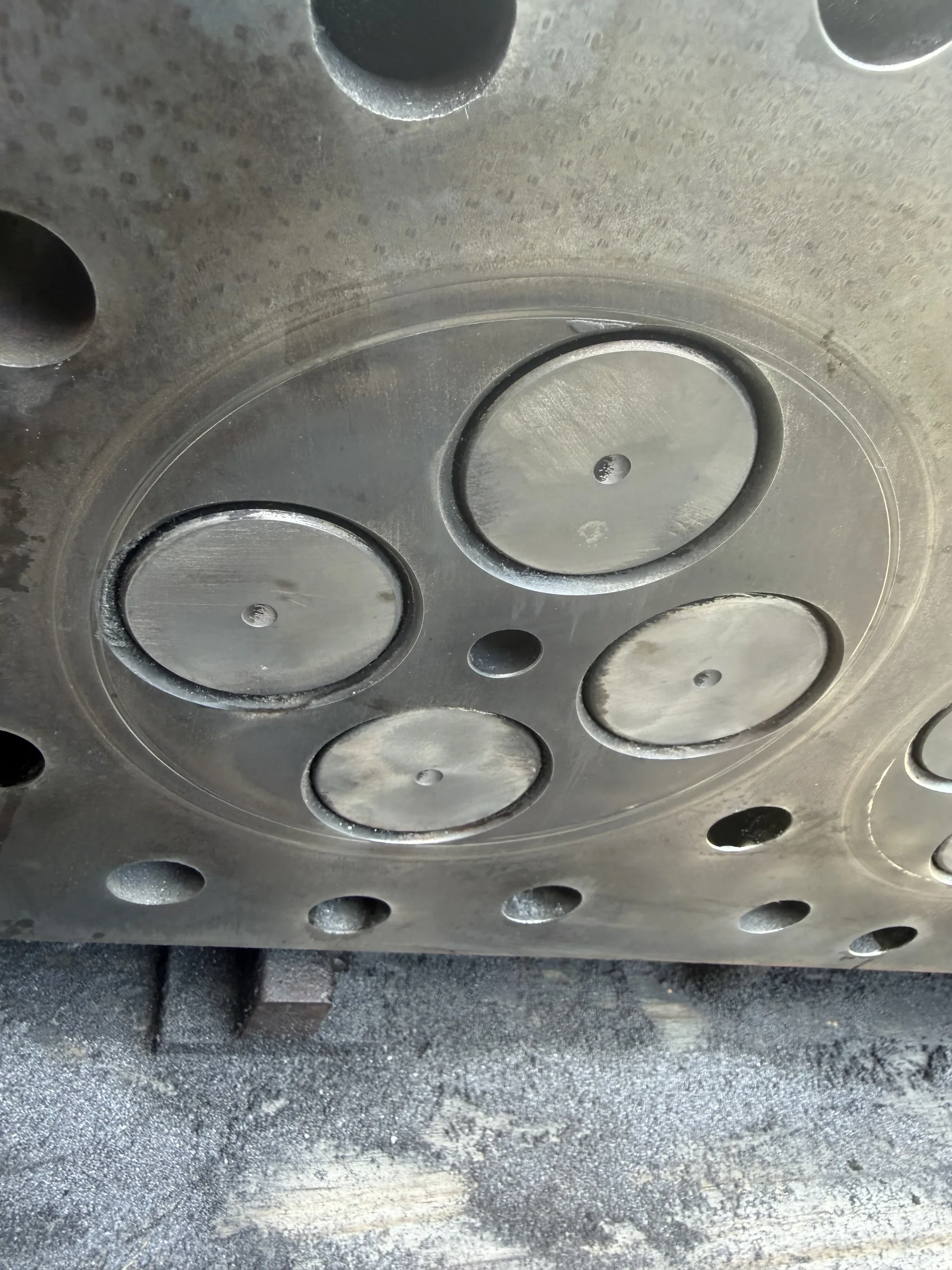 Engine block opened with cylinders and pistons exposed