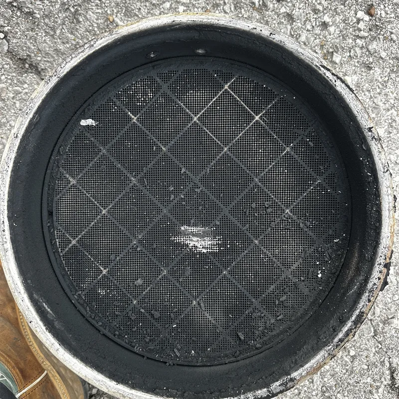 Diesel particulate filter set on the ground after removal