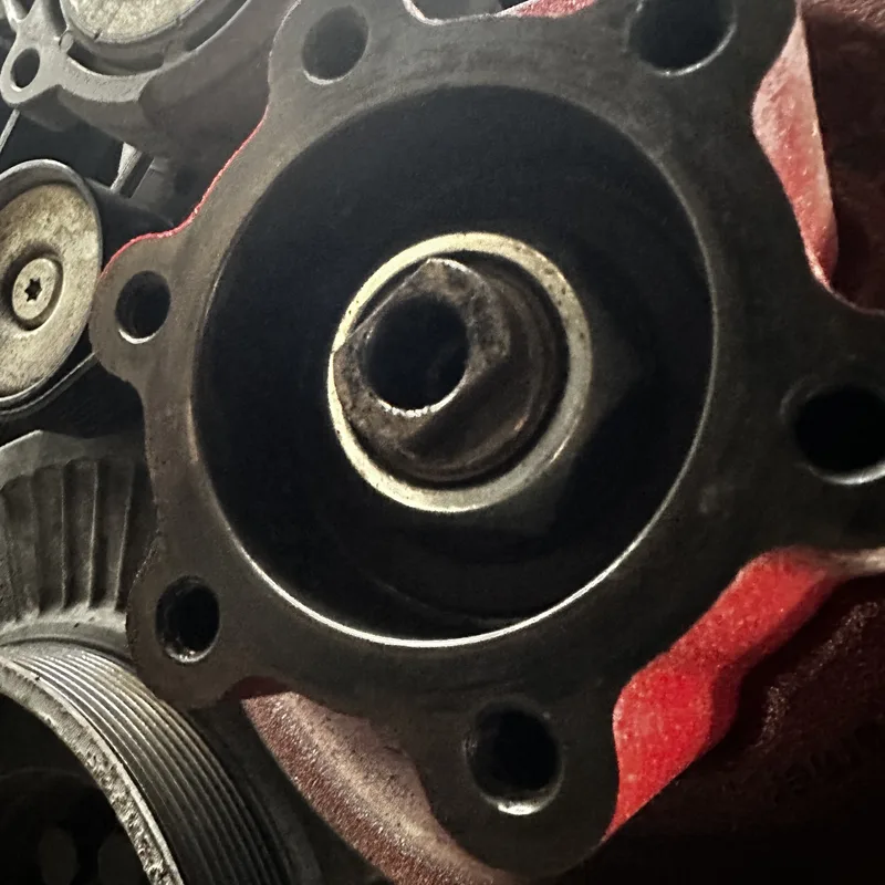 Gear-driven engine accessory on the front of the block