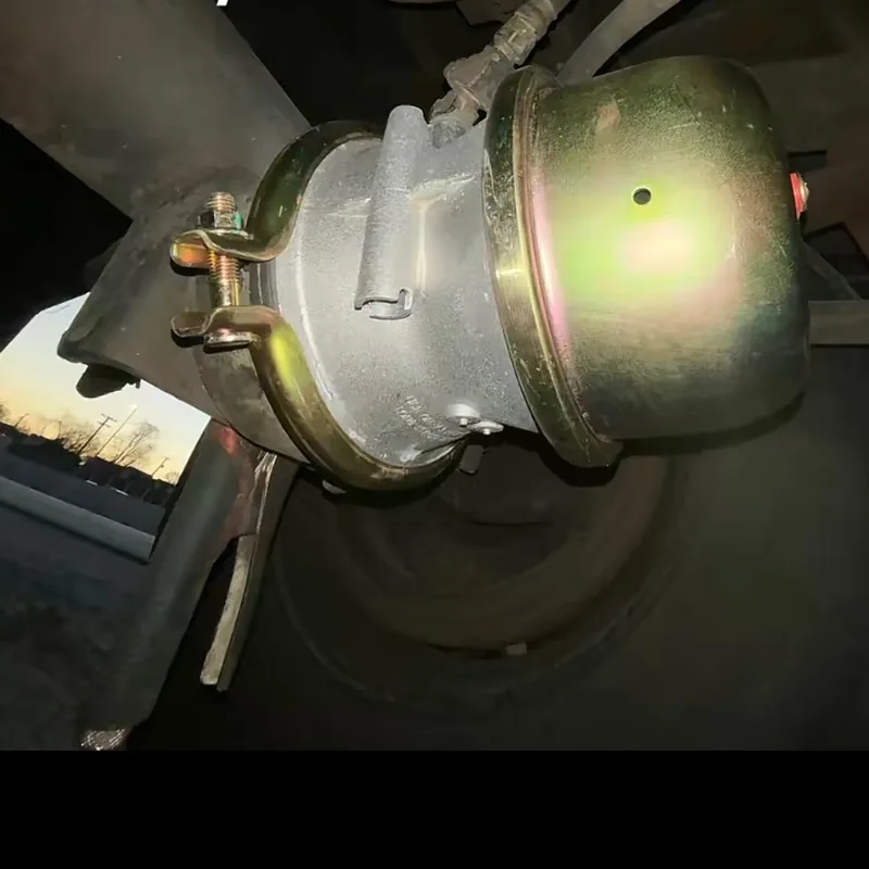 Air brake chamber and S-cam viewed from under the chassis