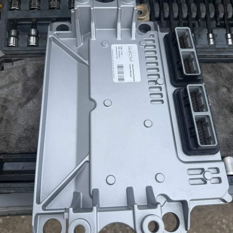 Engine control module on a workbench after removal