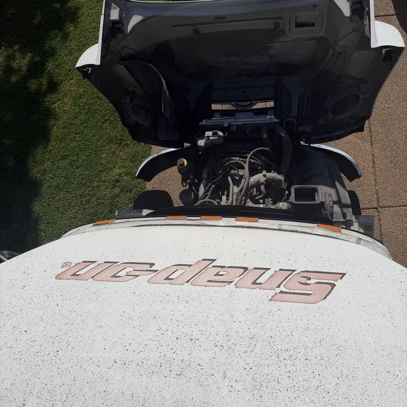 Mobile tool truck parked next to a customer truck