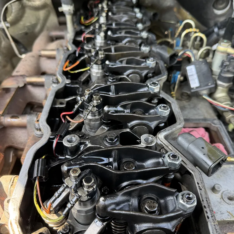 Engine head with rocker arms exposed during service