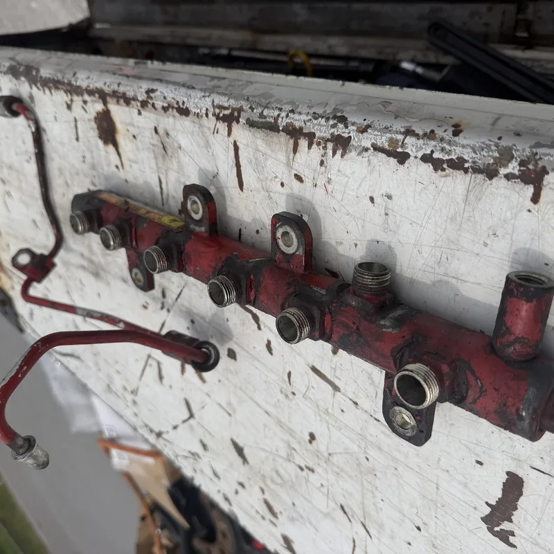 Fuel rail manifold on a workbench