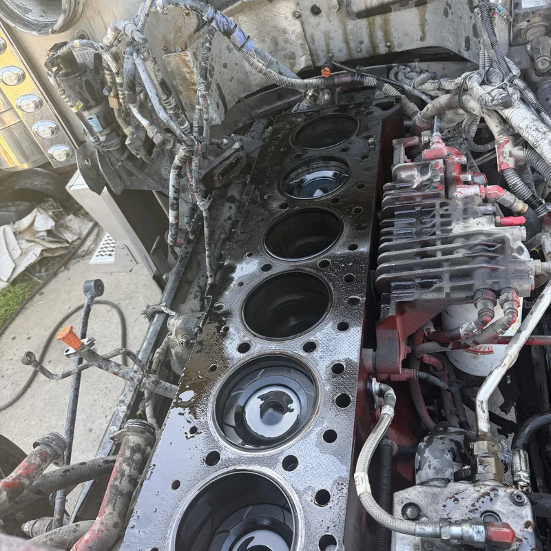 Engine block with flywheel exposed during transmission access